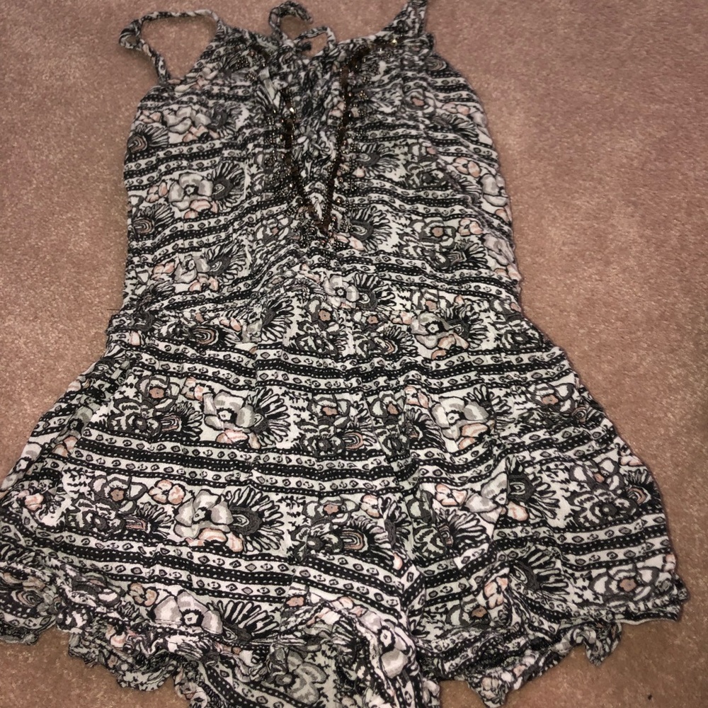 Romper/ jumpsuit